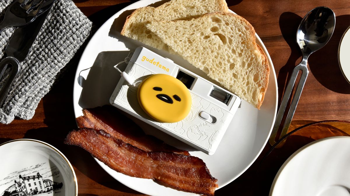 The Retrospekt and Sanrio collaboration camera featuring the character Gudetama, a lackadaisical egg character 