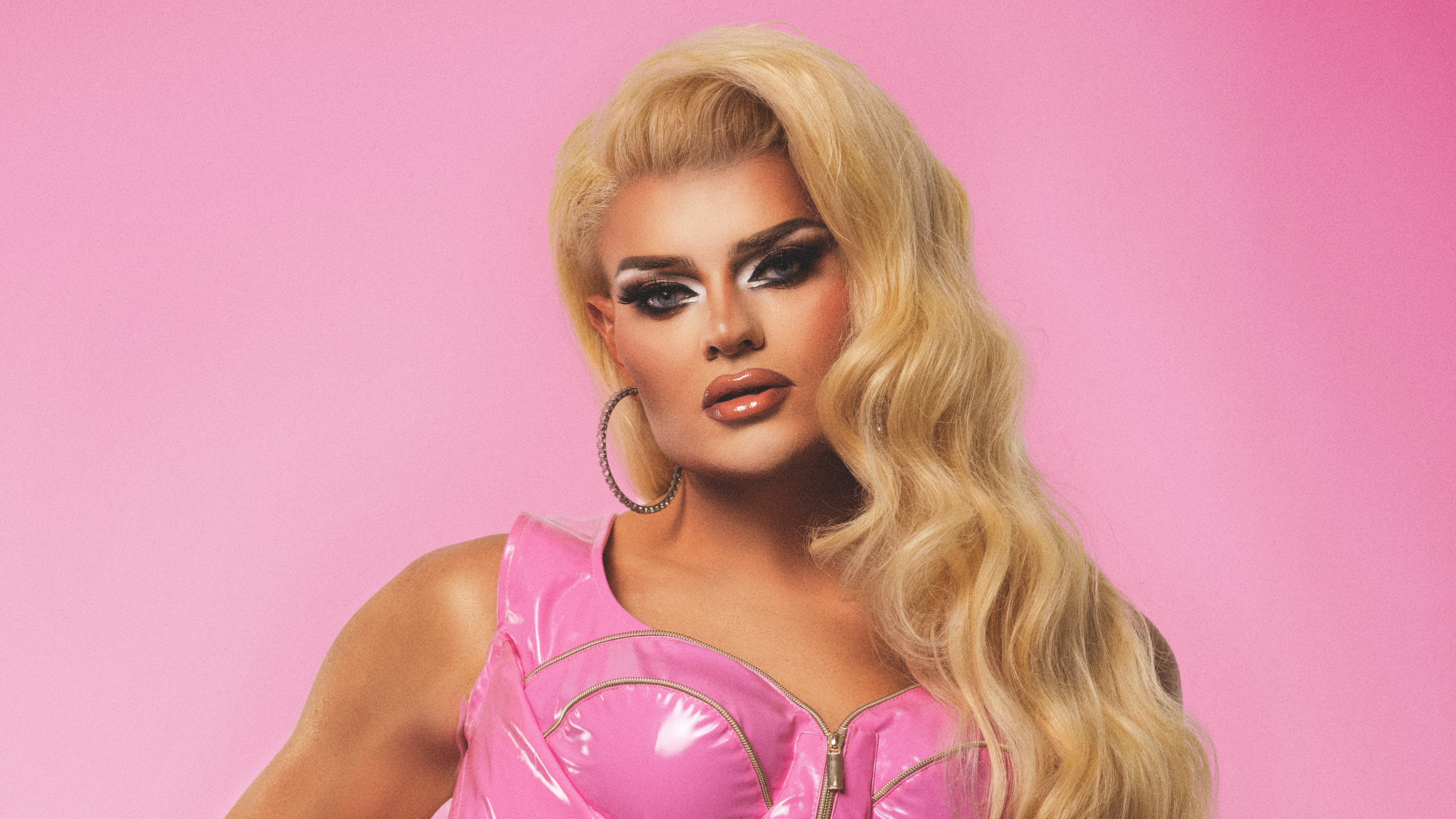 A close up shot of Kitty Scott Claus from RuPaul's Drag Race UK