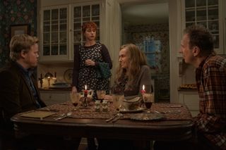 I'm Thinking of Ending Things: Jake's family sits around the dinner table as his girlfriend moves to leave.