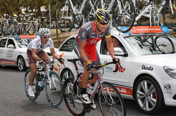 Lance Armstrong has time for a laugh on the road.