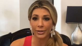 Alexis Bellino appearing on a podcast for Bravo
