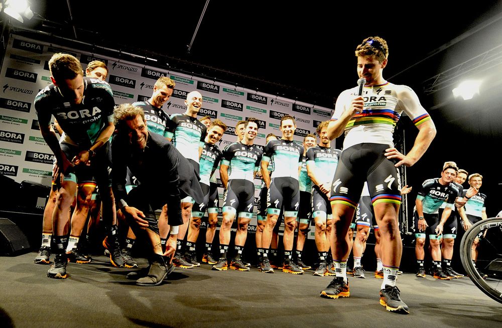 Peter Sagan checks out team manager Ralph Denk's new 'Peter Sagan' tattoo