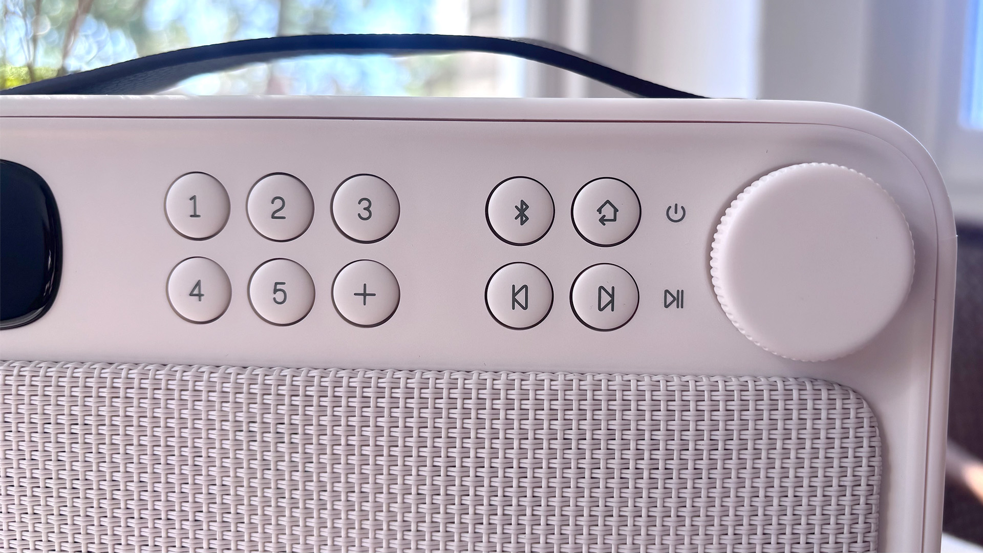 Pure Bloom DAB radio close up on number pad and volume control