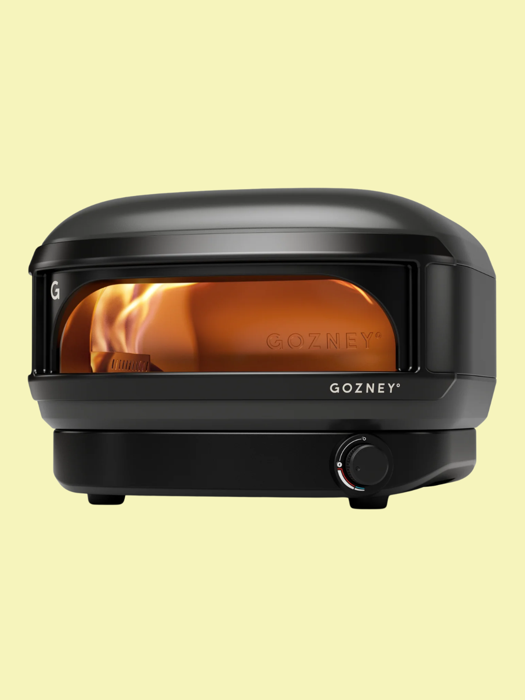 A black outdoor pizza oven from Gozney