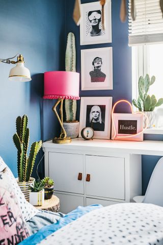 Child's blue bedroom with flamingo lamp