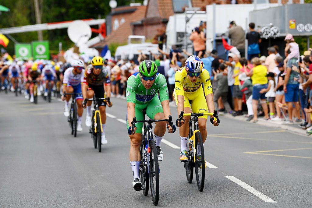 WALLERS FRANCE JULY 06 LR Fabio Jakobsen of Netherlands and QuickStep Alpha Vinyl Team Green Points Jersey and Wout Van Aert of Belgium and Team Jumbo Visma Yellow Leader Jersey compete in the intermediated sprint during to the 109th Tour de France 2022 Stage 5 a 157km stage from Lille to WallersArenberg TDF2022 WorldTour on July 06 2022 in Wallers France Photo by Tim de WaeleGetty Images
