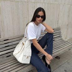 Kelsey Merritt wearing the Chanel 25 Handbag