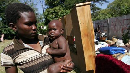 zimbabwe woman with baby