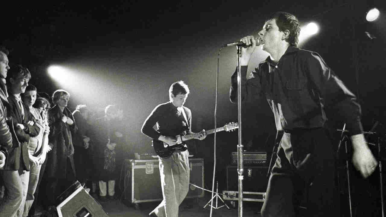 Joy DIvision performing onstage in 1980