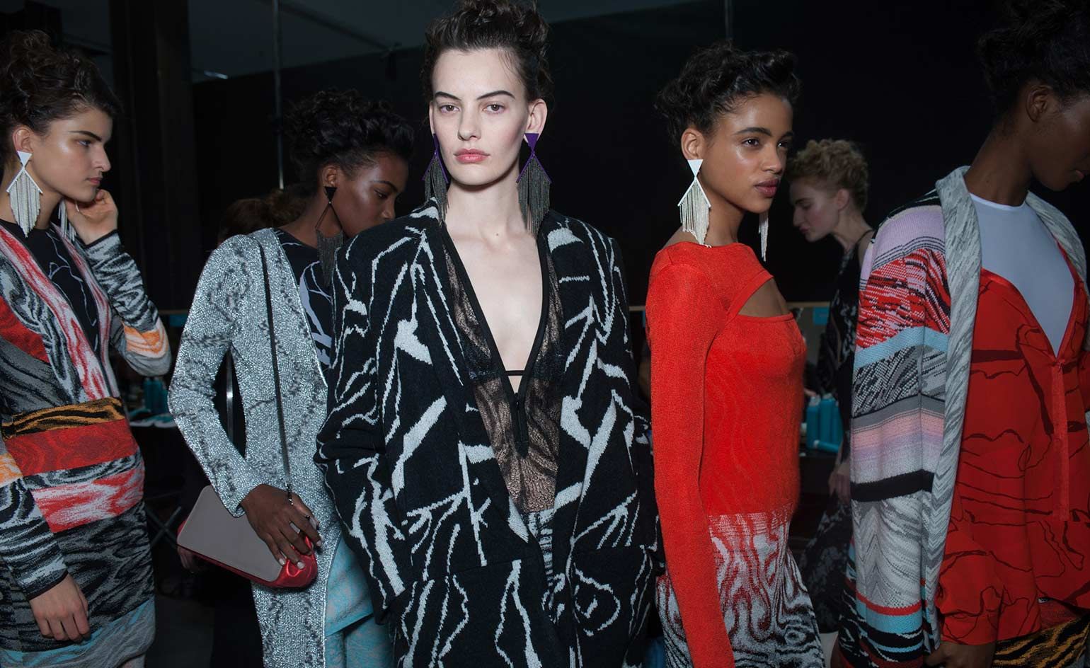 Metal tasselled earrings made from lightweight lacquered brass