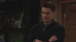 Mark Grossman as Adam with his arms crossed in The Young and the Restless