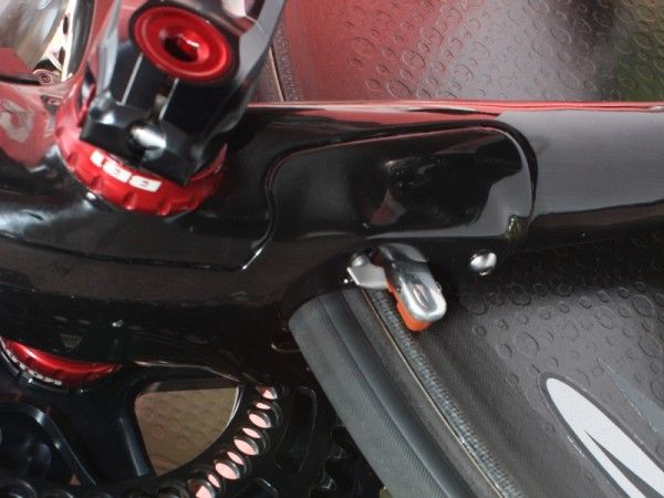 The P4's rear brake is tucked inside the chain stays.