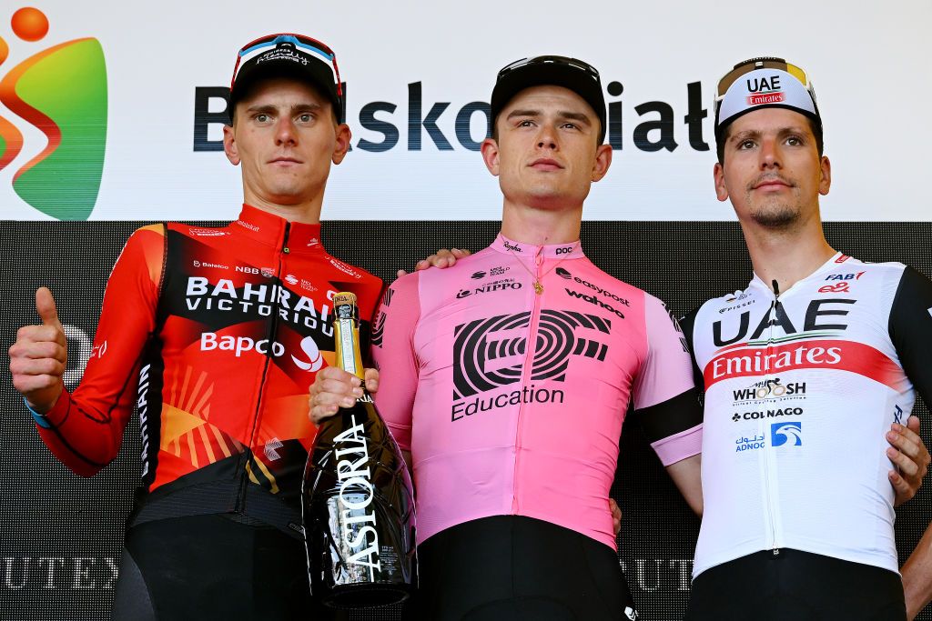 BIELSKOBIALA POLAND AUGUST 02 LR Matej Mohori of Slovenia and Team Bahrain Victorious on second place stage winner Marijn Van Den Berg of The Netherlands and Team EF EducationEasyPost and Joo Almeida of Portugal and UAE Team Emirates on third place pose on the podium ceremony after the 80th Tour de Pologne 2023 Stage 5 a 1988km stage from Pszczyna to BielskoBiala 430m UCIWT on August 02 2023 in BielskoBiala Poland Photo by Dario BelingheriGetty Images