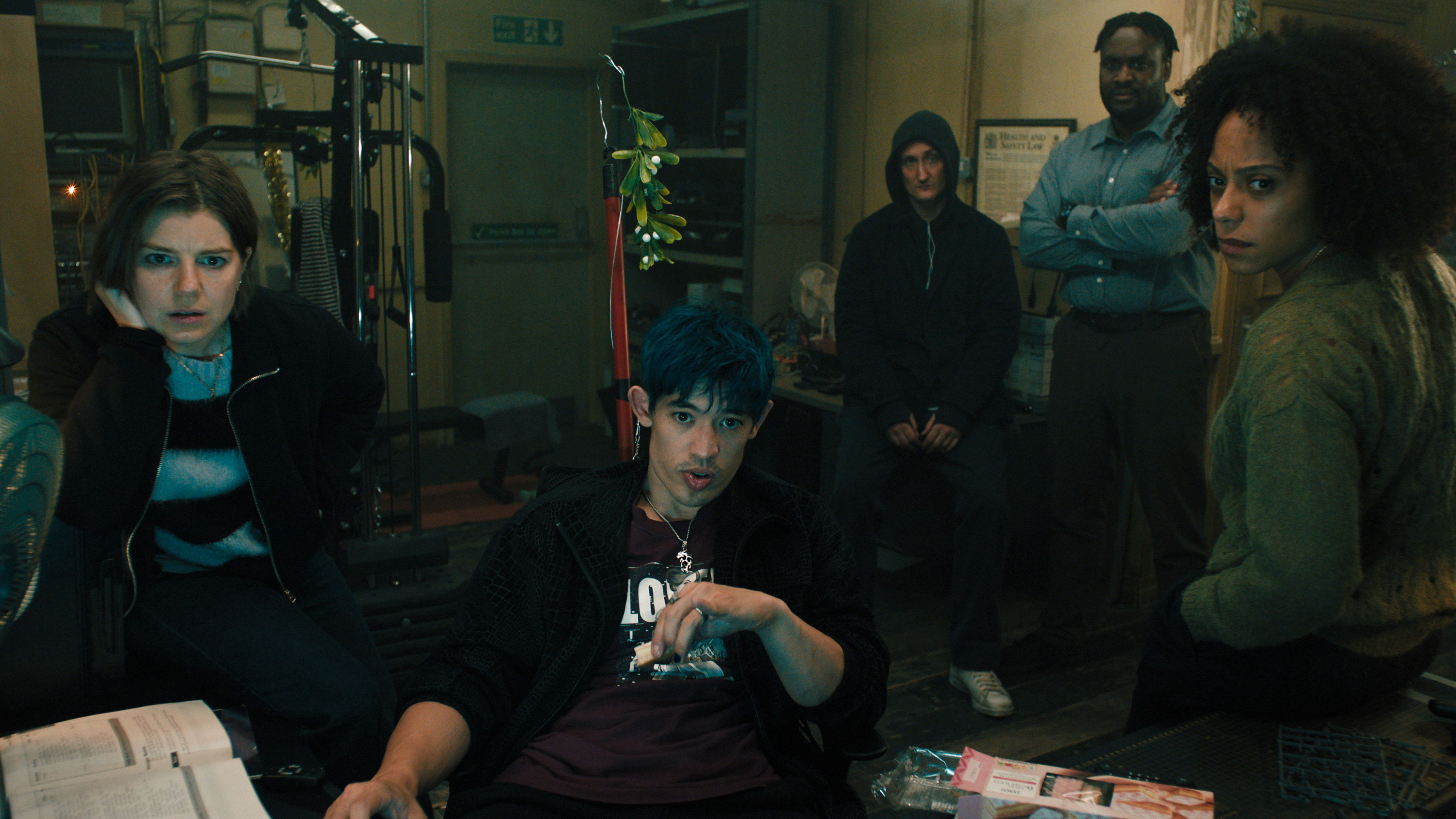 L-R: Aimee-Ffion Edwards, Christopher Chung, Tom Brooke, Kadiff Kirwan and Rosalind Eleazar together in a scene from &quot;Slow Horses&quot; season 4
