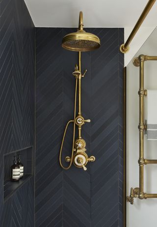shower storage ideas black bathroom brass hardware and wall niche by Drummonds