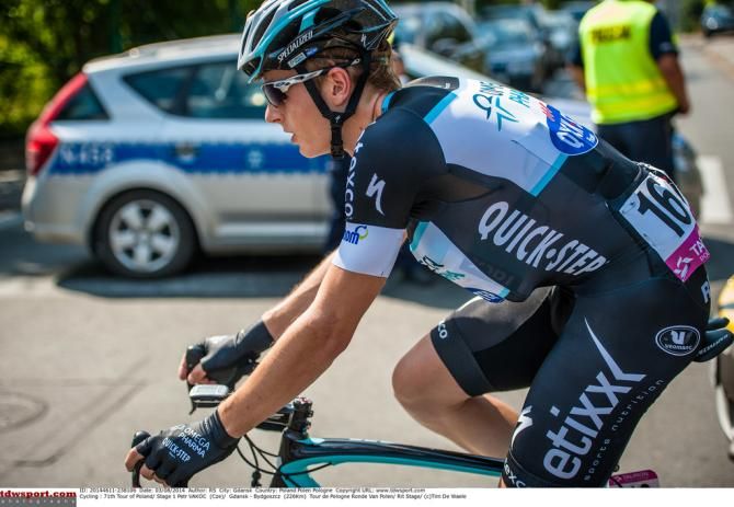 Before soloing away to victory, Petr Vakoč was on bidon duty for Omega Pharma-Quick Step