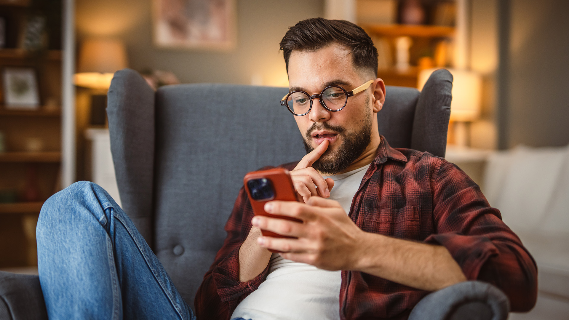 Man using phone at home