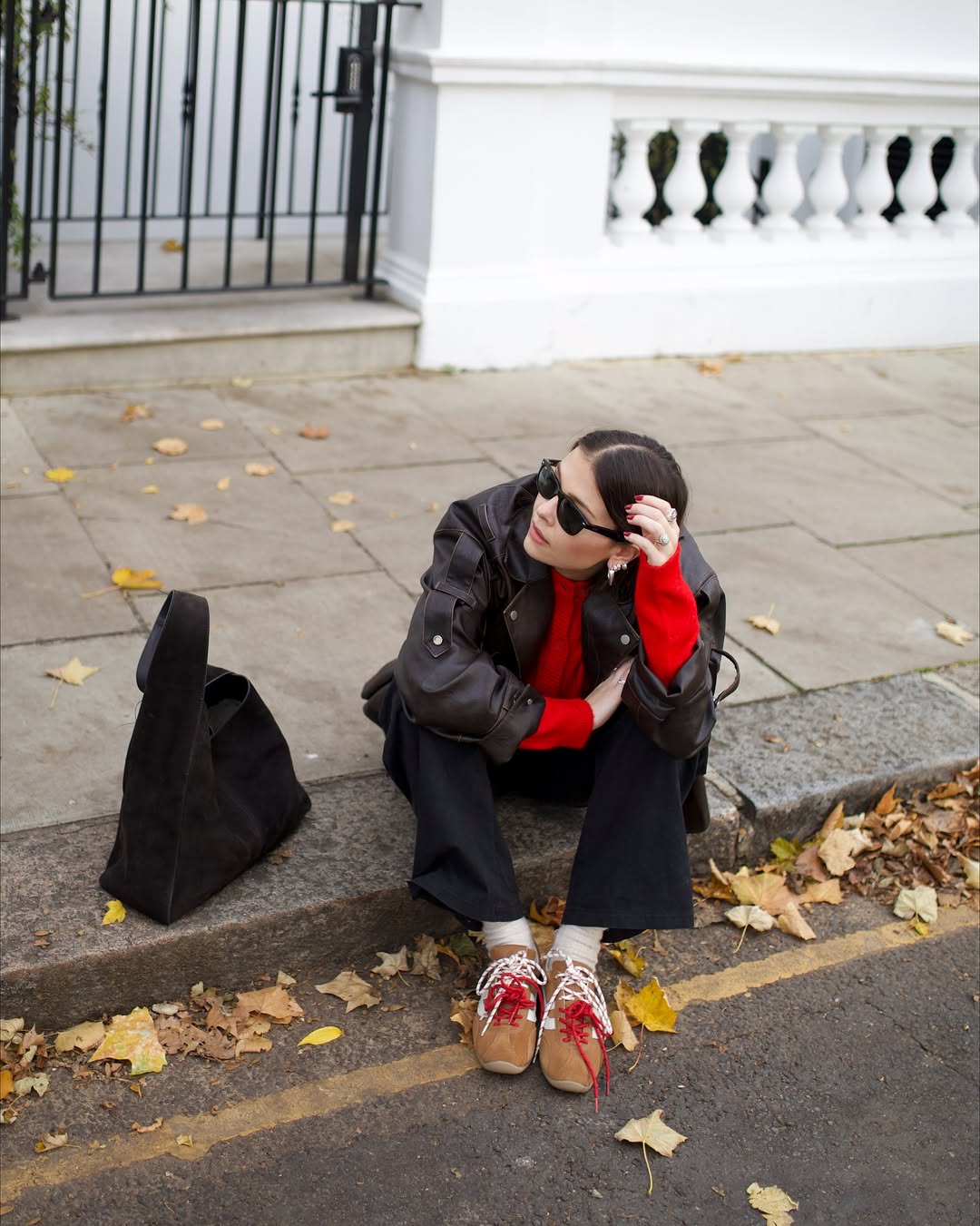Alice Satterthwaite wearing double lace trainers.