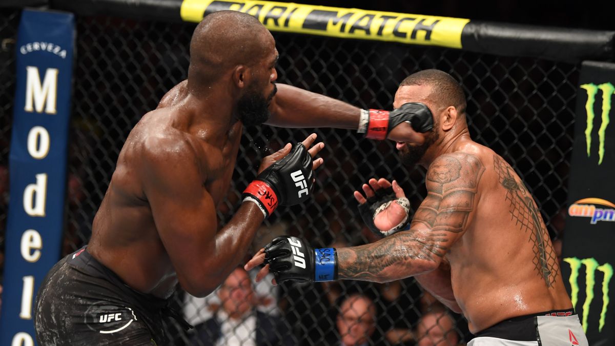 Jon Jones punches Thiago Silva of Brazil ahead of UFC 309: Jones vs Miocic at MSG, New York