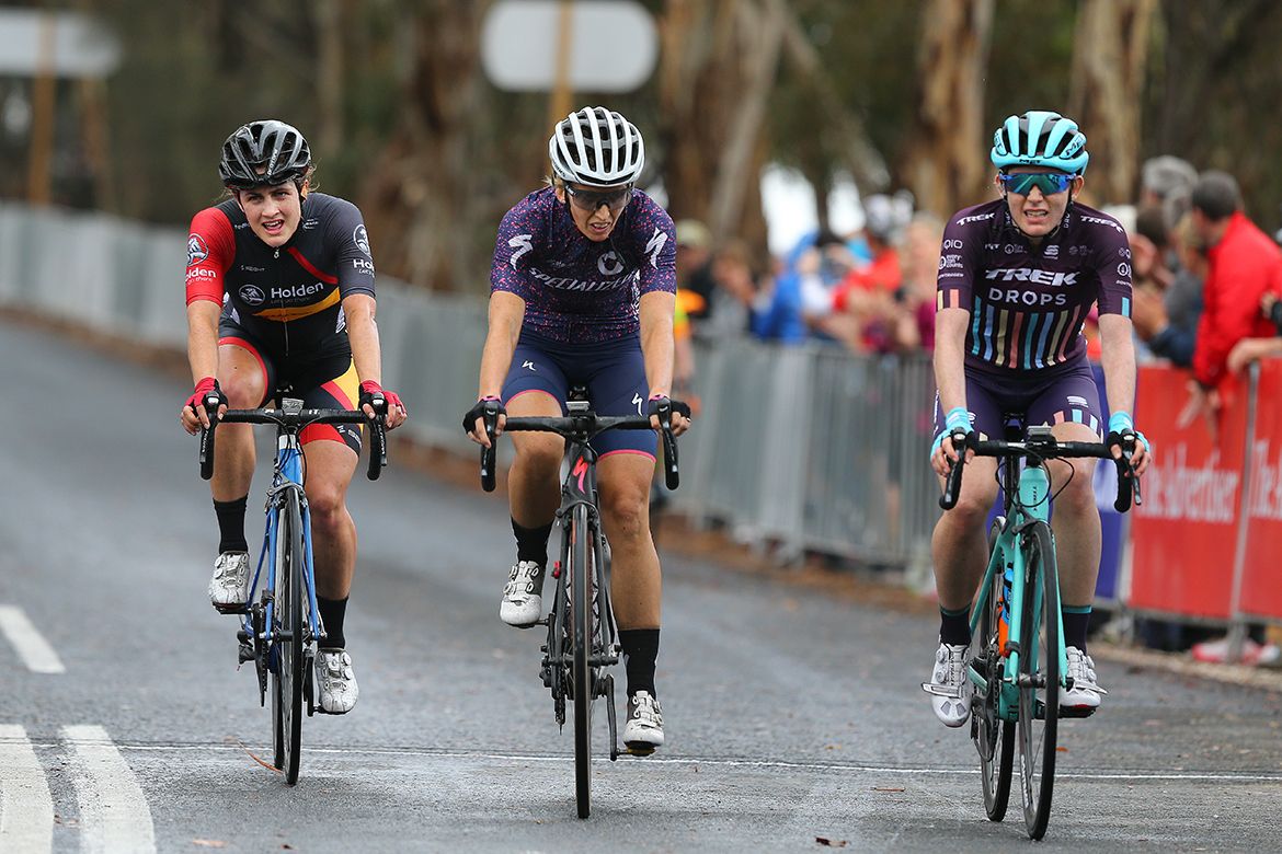 Grace Brown leads a small group over the line