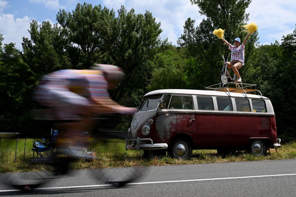 VILLENEUVESURLOT FRANCE JULY 11 Jonas Abrahamsen of Norway and Team UnoX Mobility Polka Dot Mountain Jersey competes in the breakaway while fans cheer during the 111th Tour de France 2024 Stage 12 a 2036km stage from Aurillac to VilleneuvesurLot UCIWT on July 11 2024 in VilleneuvesurLot France Photo by Dario BelingheriGetty Images
