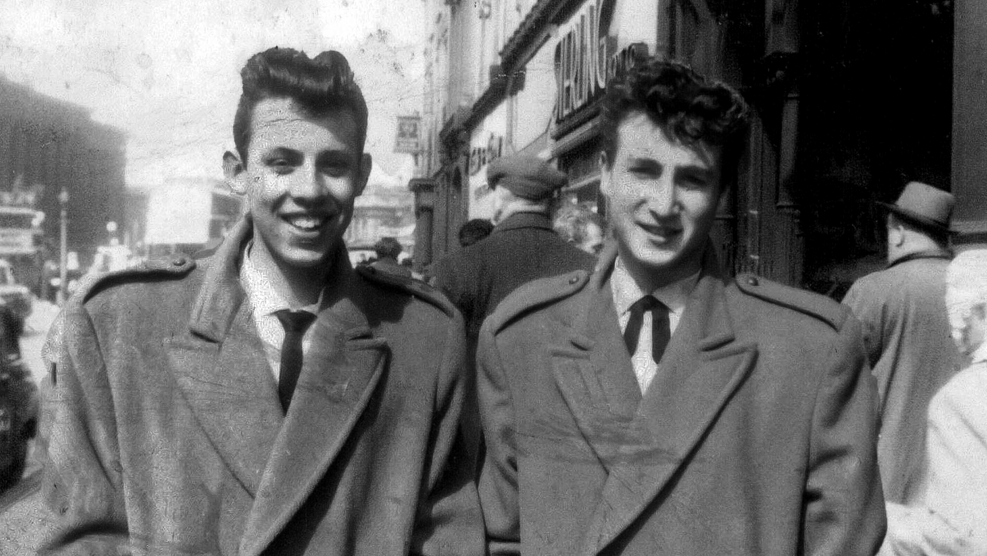 3ABKTCR May 05, 1958 - Liverpool, England, United Kingdom - A long-lost picture of JOHN LENNON with NIGEL WALLEY, who was manager of the quarrymen at the time. These were the happier times, two months before John&#039;s mother, Julia, died in a car accident. John Winston Ono Lennon, MBE (9 October 1940 - 8 December 1980), was an English songwriter, singer, musician, graphic artist, author and peace activist who gained worldwide fame as one of the founders of The Beatles.