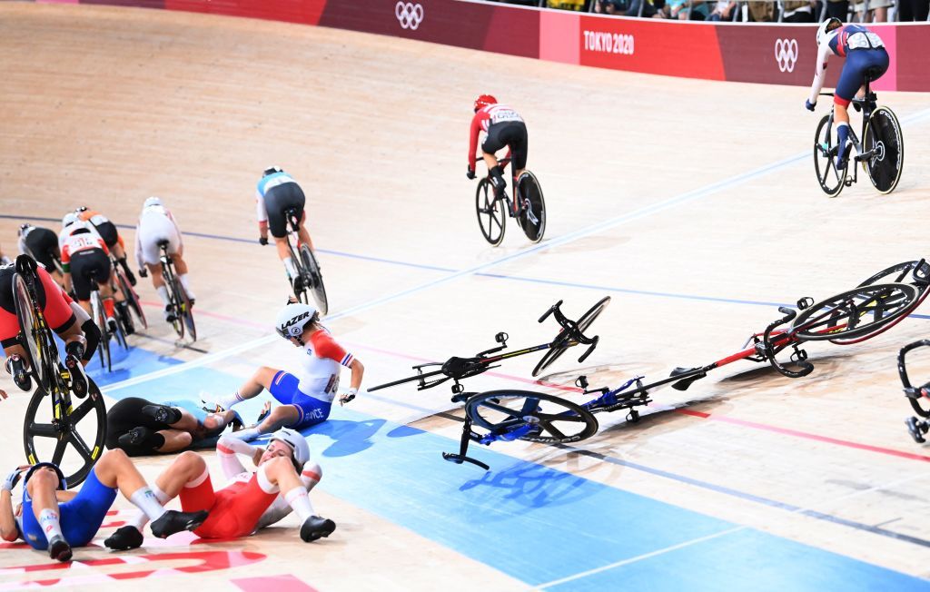 From L Italys Elisa Balsamo Polands Daria Pikulik and Frances Clara Copponi react after crashing during the womens track cycling omnium scratch race during the Tokyo 2020 Olympic Games at Izu Velodrome in Izu Japan on August 8 2021 Photo by Peter PARKS AFP Photo by PETER PARKSAFP via Getty Images