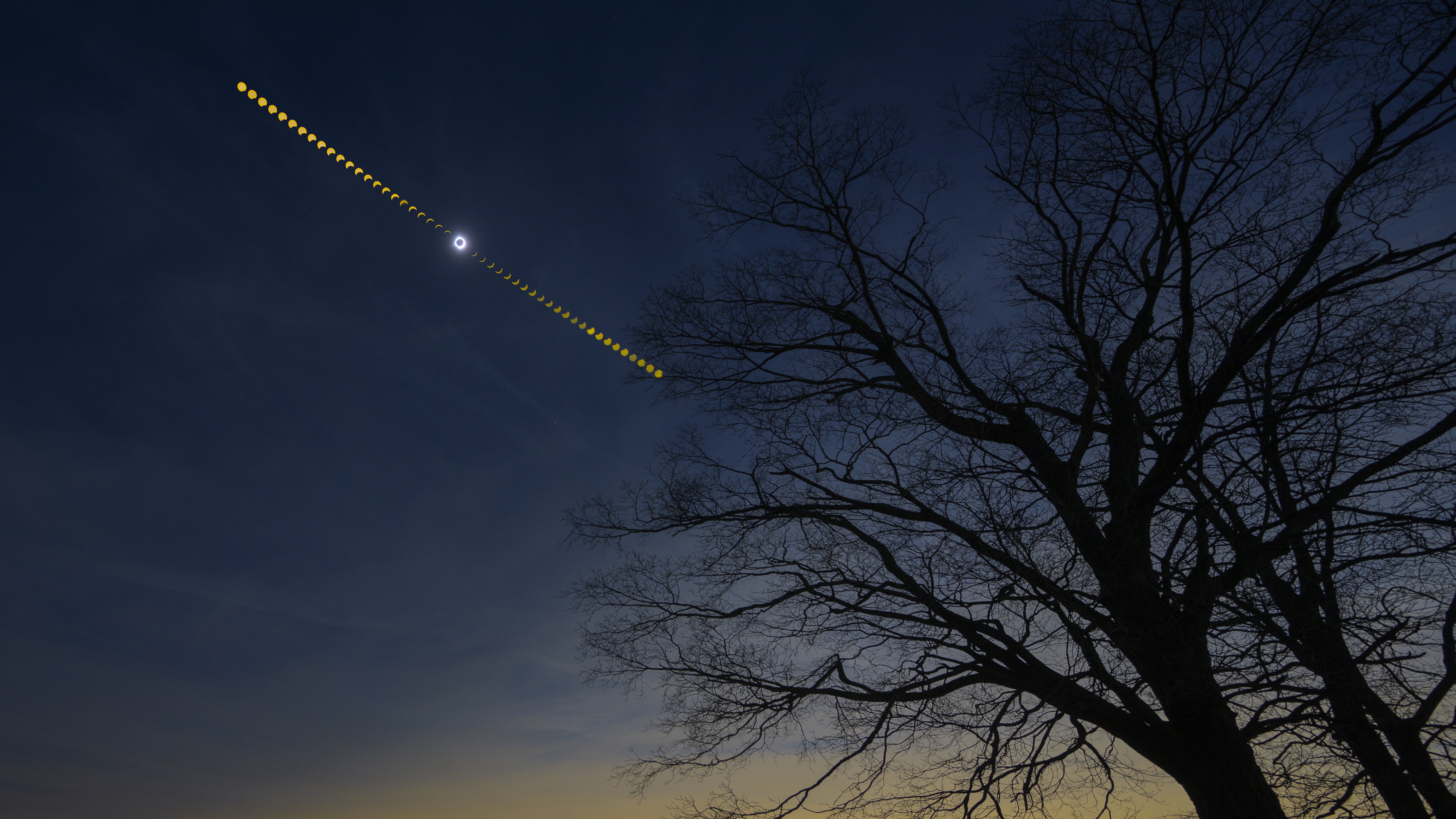 Solar eclipse 2024 - Composite of the trail of total eclipse over the totality sunset