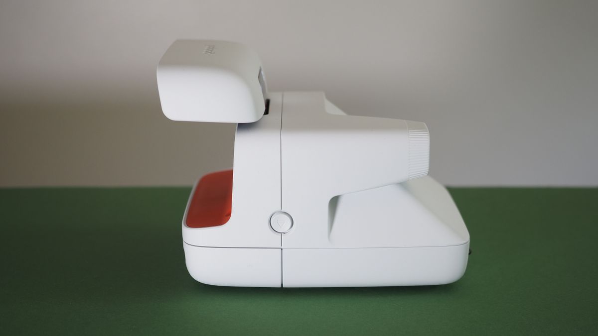 Polaroid Flip camera on a green surface