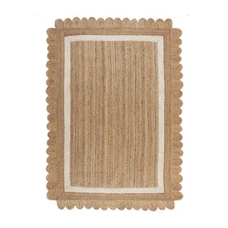 Scalloped jute rug