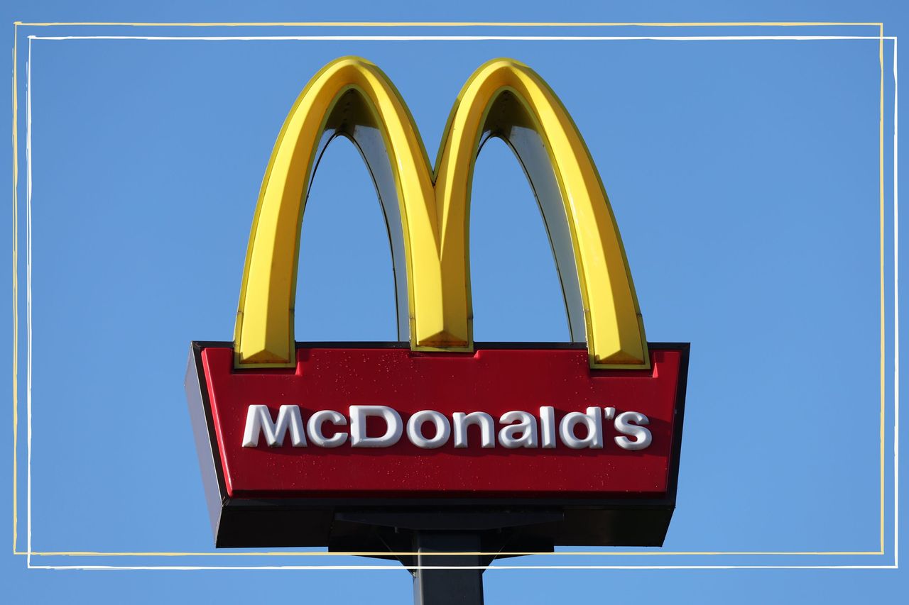 McDonald&#039;s axed breakfast - The American fast food company, McDonalds logo is displayed across a blue sky outside one of its stores on November 23, 2022 in Rugeley, England