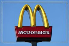 McDonald's axed breakfast - The American fast food company, McDonalds logo is displayed across a blue sky outside one of its stores on November 23, 2022 in Rugeley, England