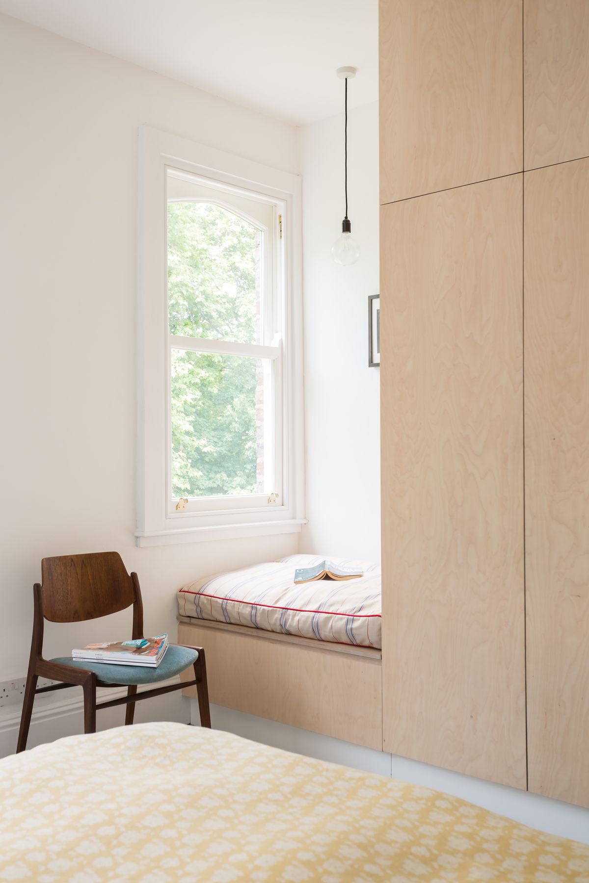 plywood wardrobe in renovated bedroom