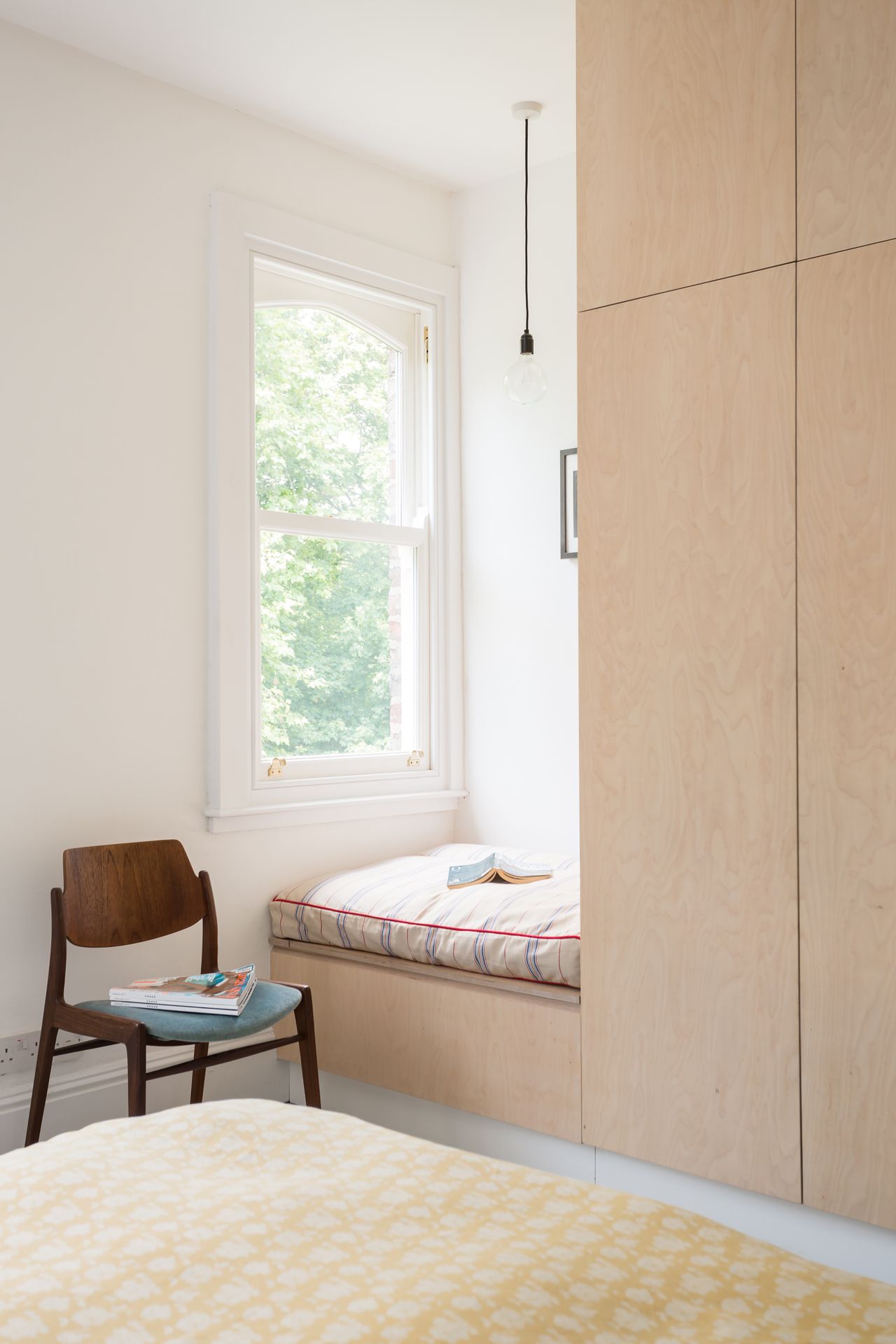 plywood wardrobe in renovated bedroom