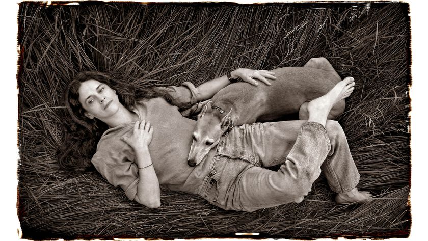MAY 24 , 2024: Photographer Sally Mann relaxes with her dog "Honey" in a meadow of tall grass on her farm near Lexington, Virginia, USA. (Photo by Michael Williamson/The Washington Post via Getty Images)