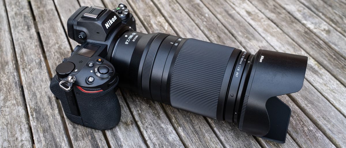 Nikkor Z 70-180mm f/2.8 attached to a Nikon Z 7II on a wooden outdoor table