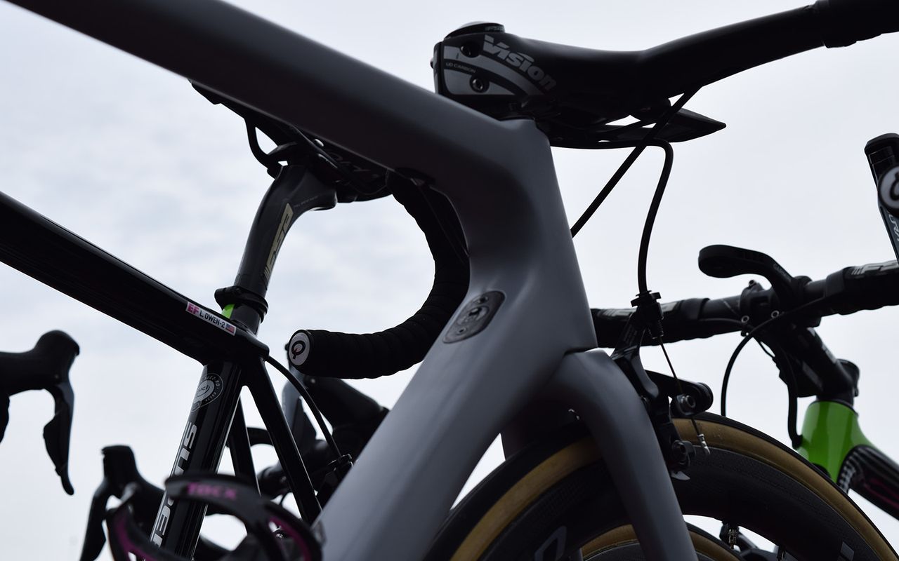 The rear brake cable is neatly routed into the top tube of the frame