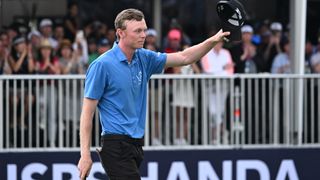 Ryggs Johnston takes his hat off to the fans at the ISPS Handa Australian Open