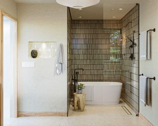 Japandi bathroom with bath and shower area