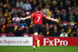 Shane Long of Southampton celebrates after scoring his team's first goal during the Premier League match between Watford FC and Southampton FC at Vicarage Road on April 23, 2019 in Watford, United Kingdom.
