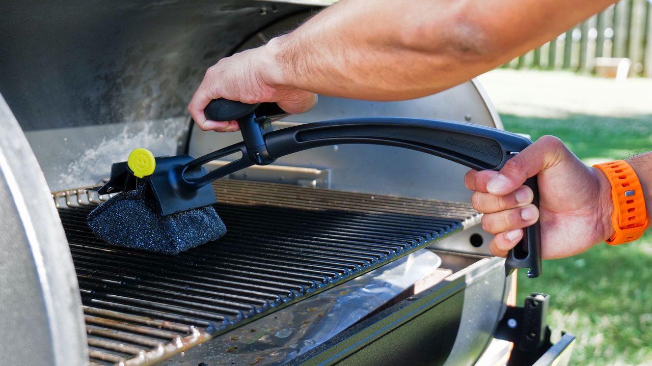 BBQ Daddy Grill Brush used to clean grill.