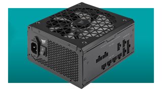 An image of a Corsair RMx Shift 750W PSU against a teal background with a white border.
