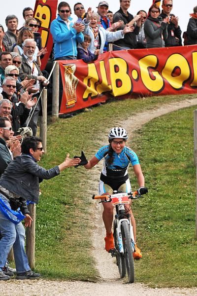 Happy with her race, Elisabeth Brandau gives a high five.