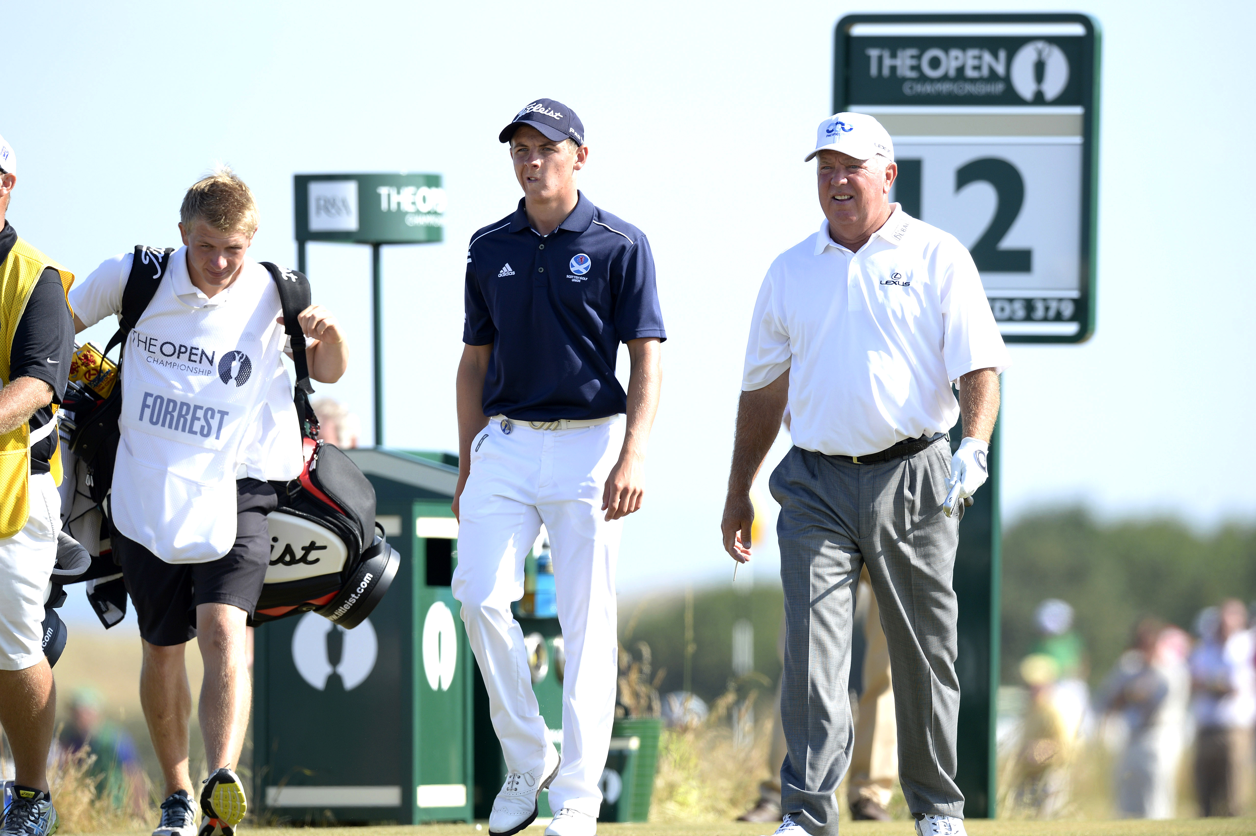 Grant Forrest (left) and Mark O'Meara walk off the 12th tee at Muirfield during the 2013 Open Championship
