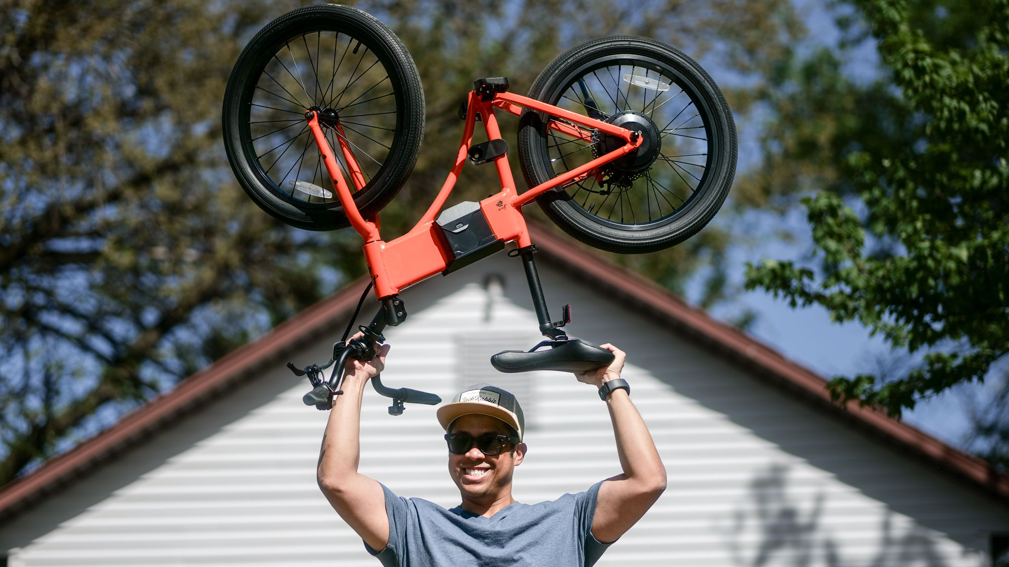 JackRabbit OG2 Pro held over arms in the air.