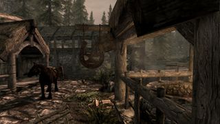 Best Skyrim mods — smoke drifts out from the forge fire across the Riverrun blacksmith's sign.