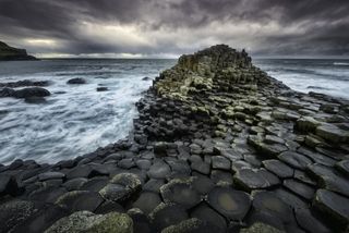 A huge seastorm rushes in onto the Giants Causeway, Northern Ireland