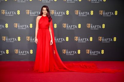 Dua Lipa Wore a Statement-Making Red Gown and Cape on the 2024 BAFTA ...