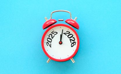 Happy New Year with red alarm clock and 2025 change to 2026 number. Merry Christmas, New Start, Resolution, countdown, Goals, Plan, Action and Mission Concept