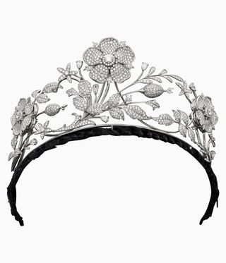 Large diamond flower tiara against a pale grey background